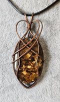 Unique Flashy Bronzite Wire Wrapped Pendant