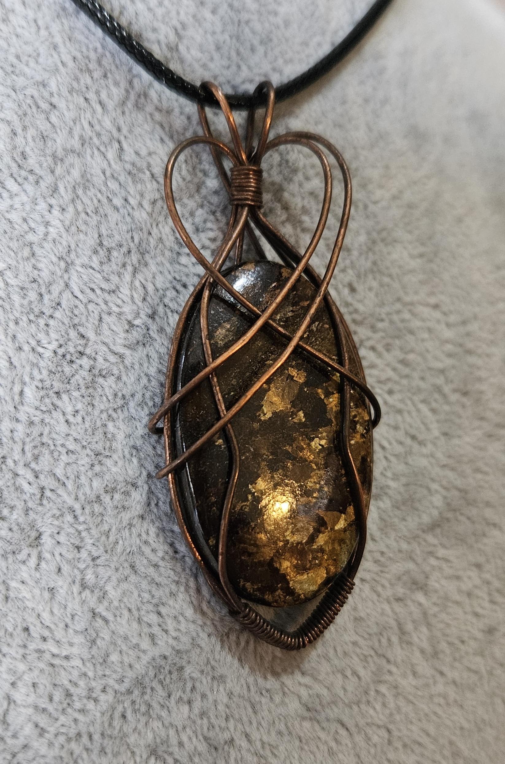 Unique Flashy Bronzite Wire Wrapped Pendant