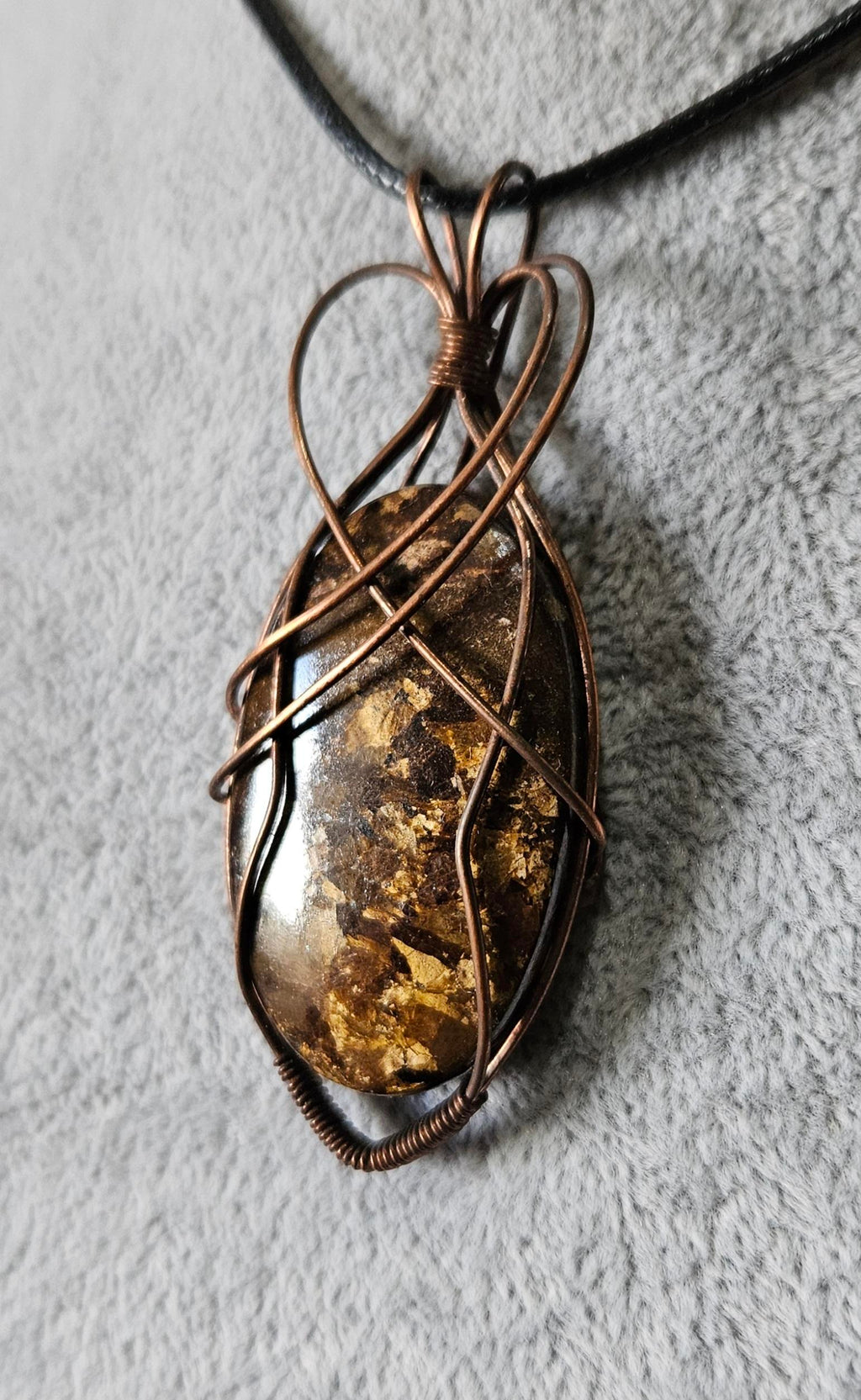 Unique Flashy Bronzite Wire Wrapped Pendant