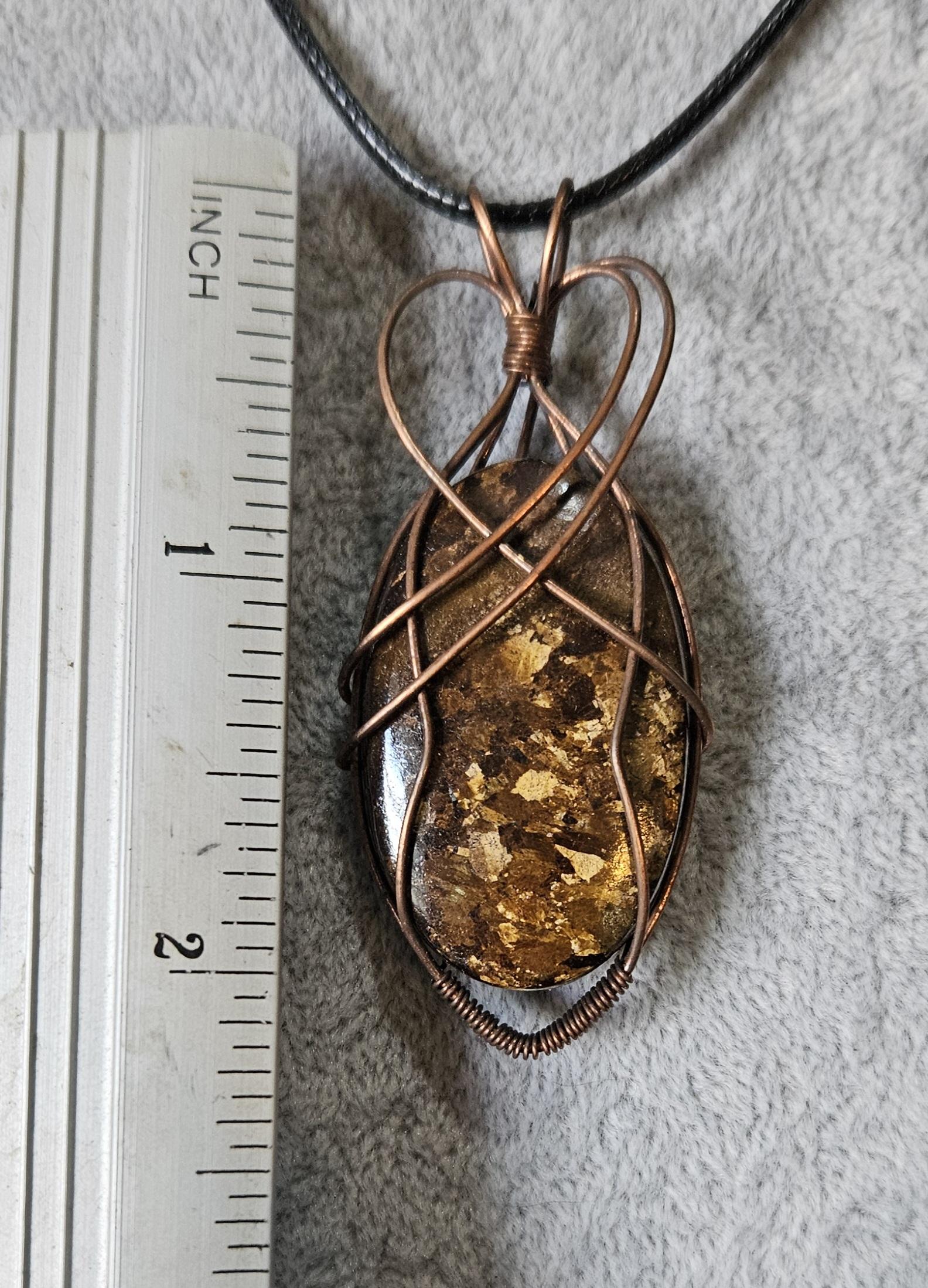 Unique Flashy Bronzite Wire Wrapped Pendant